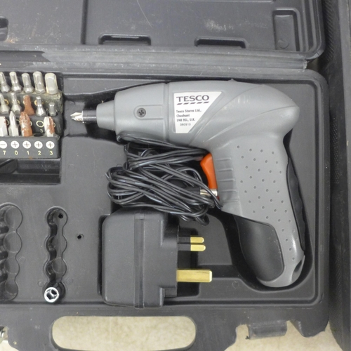 A Tesco SD482G mini drill a WorkX WX14DD 14.4V drill with battery and charger in case and a quanti