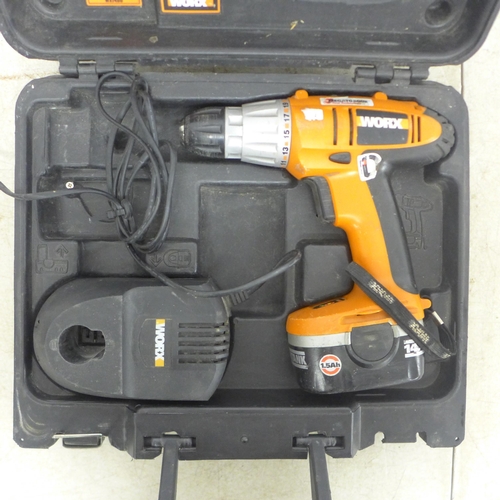 2018 - A Tesco SD482G mini drill, a WorkX WX14DD, 14.4V drill with battery and charger in case and a quanti... 