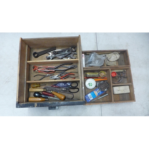 2023 - A wooden four drawer workshop chest of drawers with a quantity of tools including screwdrivers, plie... 