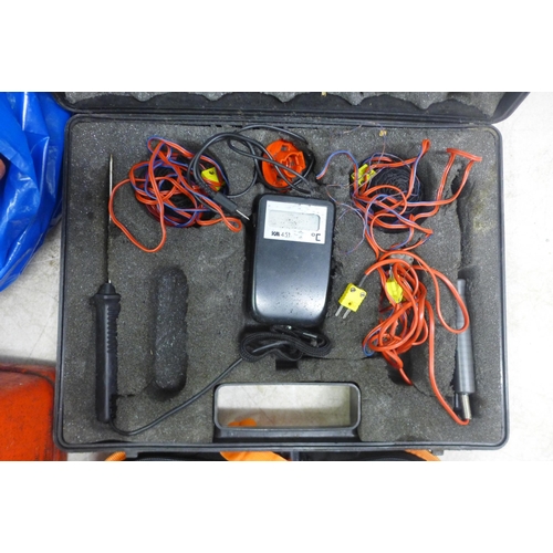 2034 - An Etepon 220V soldering iron, 2 plastic petrol cans and a KM 451 temperature tester