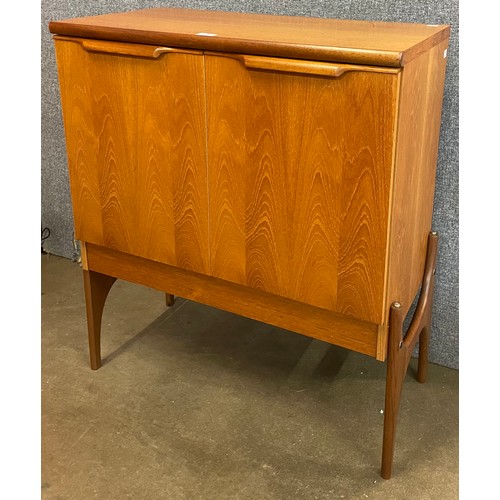 48 - A teak two door cabinet