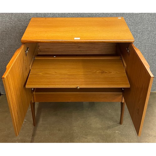 48 - A teak two door cabinet