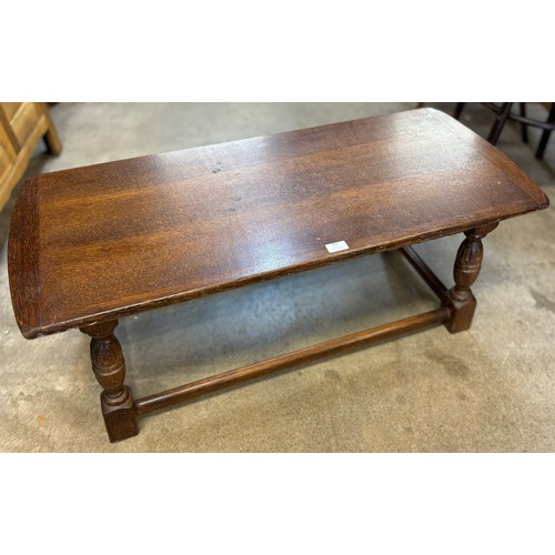 127 - A carved oak coffee table