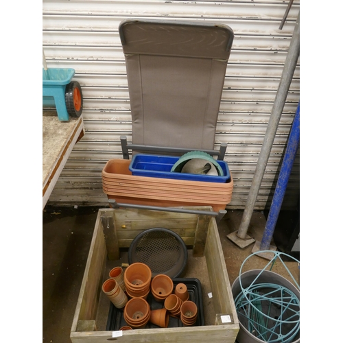 2143 - 19 assorted clay pots, 7 planter trays, 2 wooden planters and a sun lounger