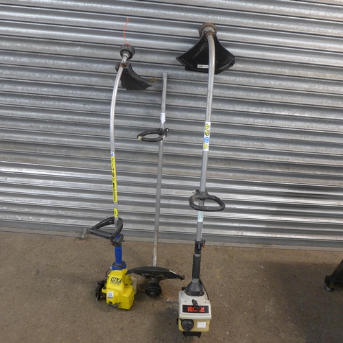 2163 - A McCulloch Trim Mac 210 petrol strimmer, a Ryobi RCT2800CB petrol strimmer and a spare strimmer att... 