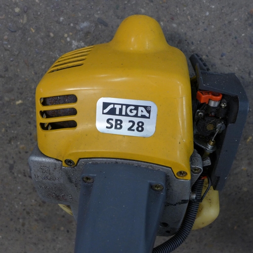 2164 - A McCulloch Trim Mac 240 petrol strimmer and a Stiga SB28 petrol strimmer and a spare strimmer attac... 