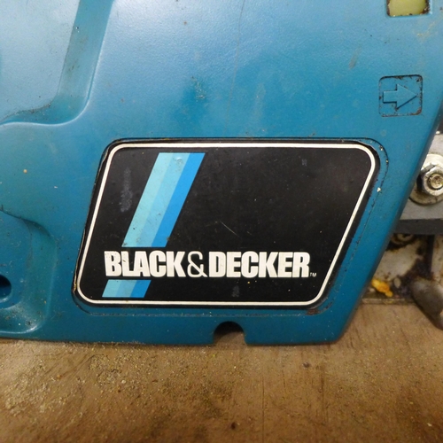 2169 - A Black and Decker electric chainsaw