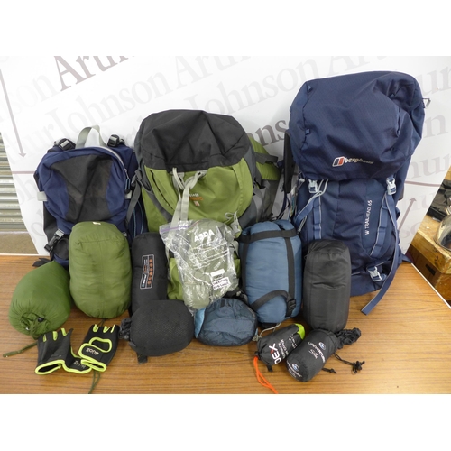 2230 - A quantity of camping gear including 3 ruck sacks (1 x 65L, 1 x 60L and one other), a sleeping bag, ... 