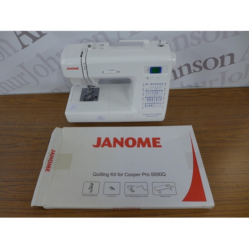 2245 - A Janome Cooper 5000Q, 220-240V sewing machine (no power supply) and extension table in box