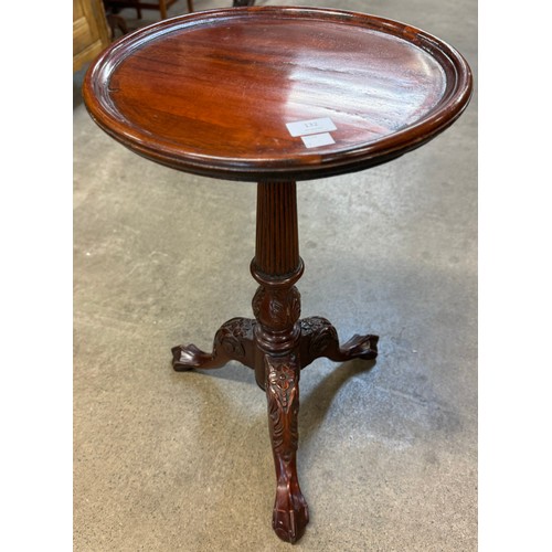 132 - A Chippendale style mahogany tripod wine table