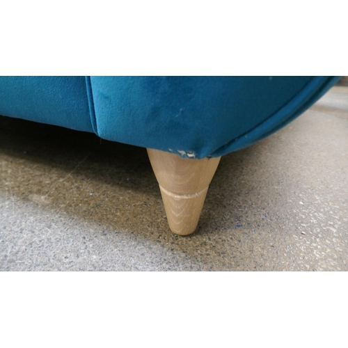 1437 - A turquoise velvet love seat - manufacturer's return