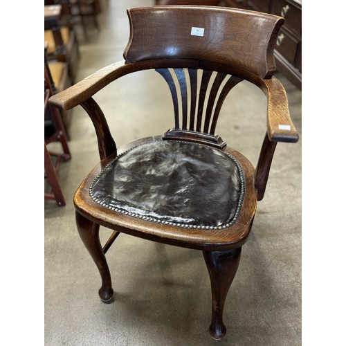 134 - An Edward VII oak desk chair