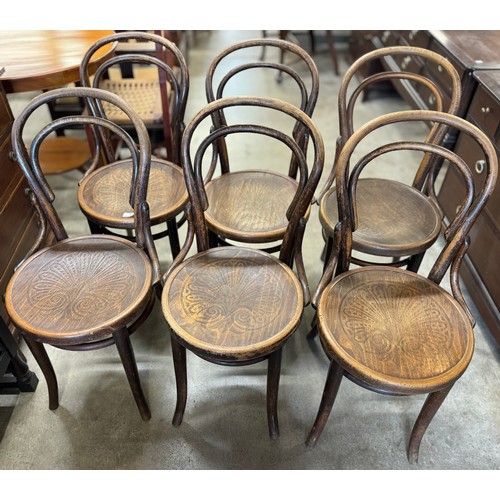 135 - A set of six early 20th Century beech bentwood chairs