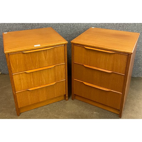 61 - A pair of teak bedside chests