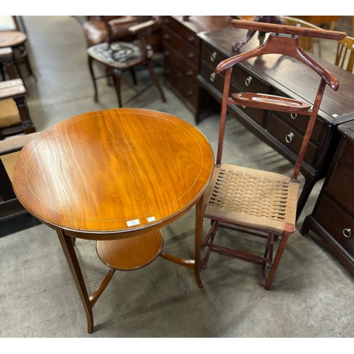 143 - An Edward VII inlaid walnut circular centre table and a gentleman's valet stand