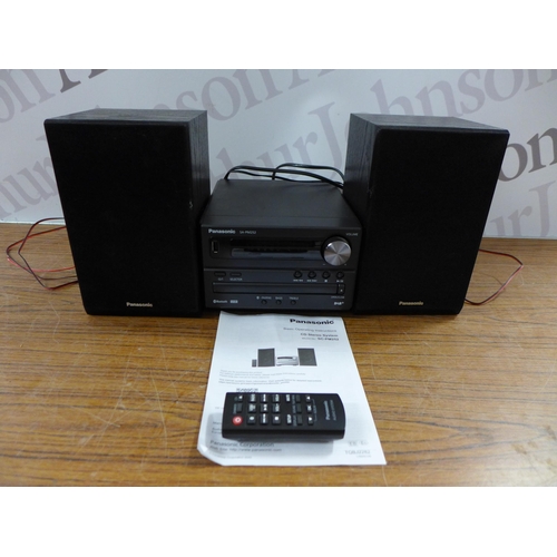 2082 - A Panasonic SA-PM252 micro hi-fi system including DVD/Bluetooth player and a pair of Panasonic speak... 