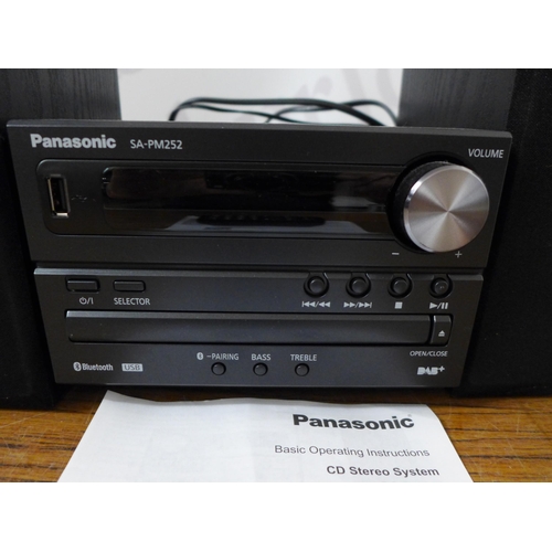 2082 - A Panasonic SA-PM252 micro hi-fi system including DVD/Bluetooth player and a pair of Panasonic speak... 