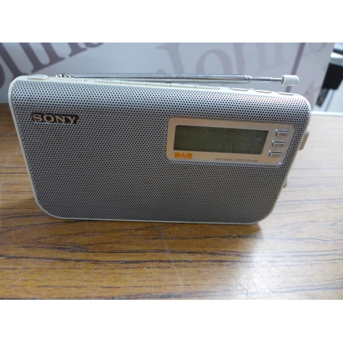 2103 - A quantity of assorted radios including a Sony CFD-V7 CD radio cassette-corder, a Roberts Revival Un... 