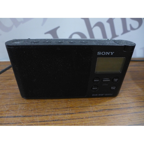 2103 - A quantity of assorted radios including a Sony CFD-V7 CD radio cassette-corder, a Roberts Revival Un... 