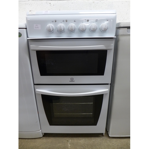 2108 - An Indesit KD-3CI(M)/G electric double oven oven and four station hob