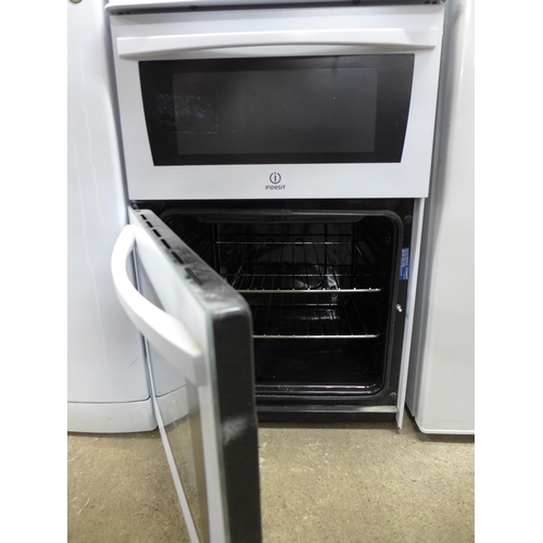 2108 - An Indesit KD-3CI(M)/G electric double oven oven and four station hob