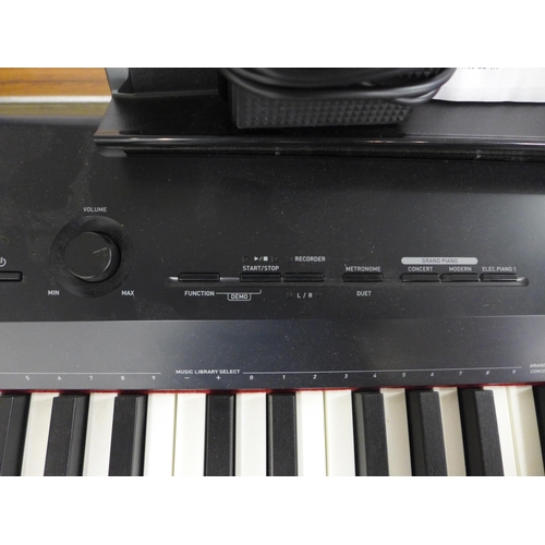 2119 - A Casio PX-160 Privia standing keyboard with adjustable legs pedal and power supply