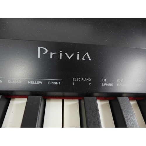 2119 - A Casio PX-160 Privia standing keyboard with adjustable legs pedal and power supply