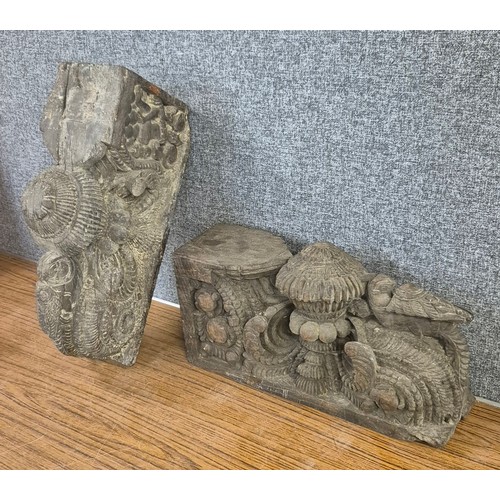 345 - A pair of Eastern carved hardwood wall brackets