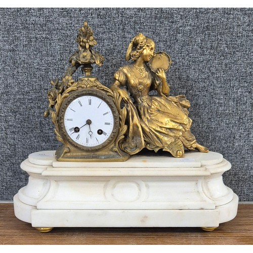 343 - A 19th Century French gilt metal and white marble mantle clock