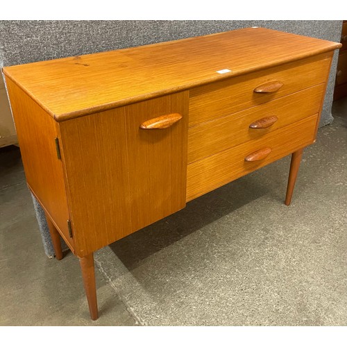 72 - A small teak sideboard