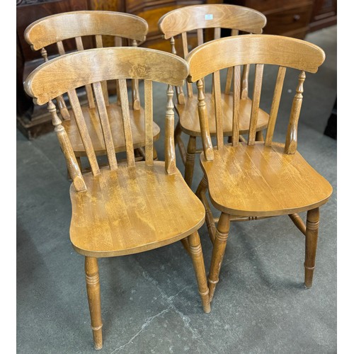 169 - A set of four beech farmhouse kitchen chairs