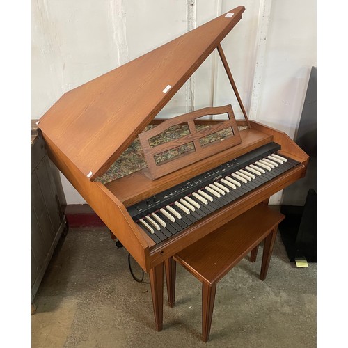 79 - A Rodgers teak electrical harpsichord