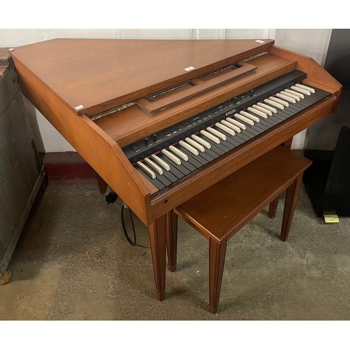 79 - A Rodgers teak electrical harpsichord