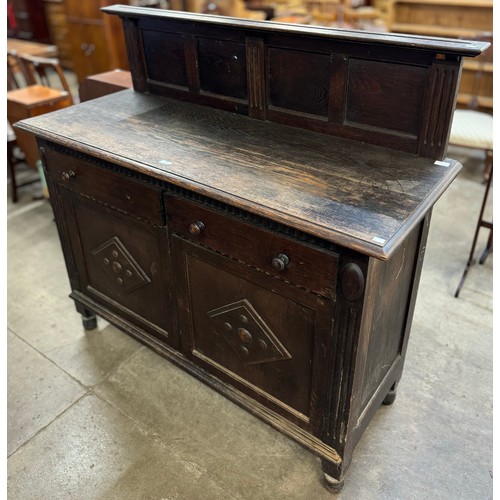 170 - An early 20th Century carved oak dresser