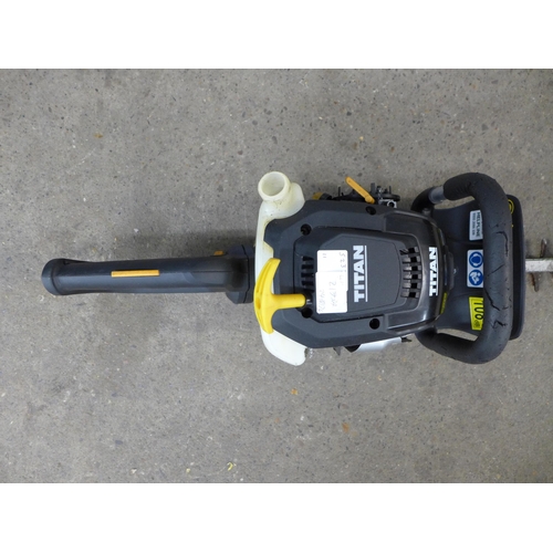 2173A - A Titan TTL688HDC petrol driven hedge trimmer and one other Titan petrol driven trimmer  * Police re... 