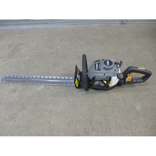 2173A - A Titan TTL688HDC petrol driven hedge trimmer and one other Titan petrol driven trimmer  * Police re... 