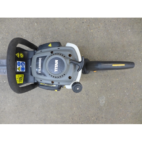 2173A - A Titan TTL688HDC petrol driven hedge trimmer and one other Titan petrol driven trimmer  * Police re... 