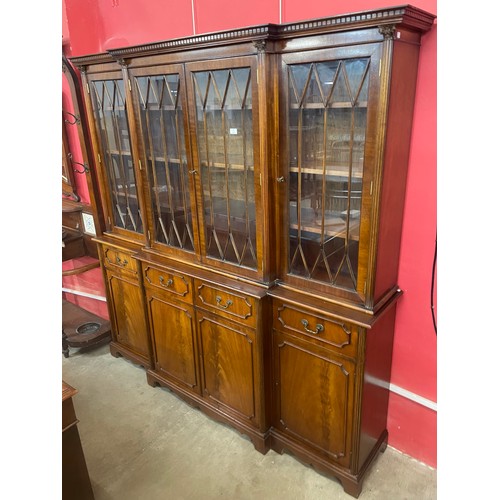 87 - A George III style mahogany breakfront library bookcase