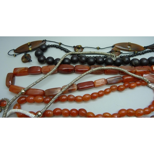 1001 - An agate bead necklace, coral, French jet, etc.