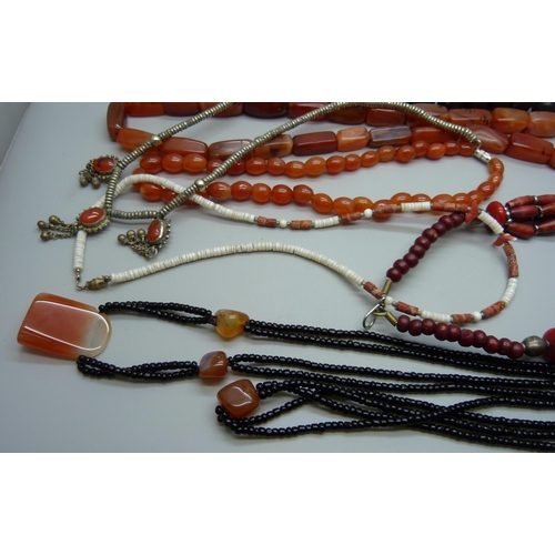 1001 - An agate bead necklace, coral, French jet, etc.