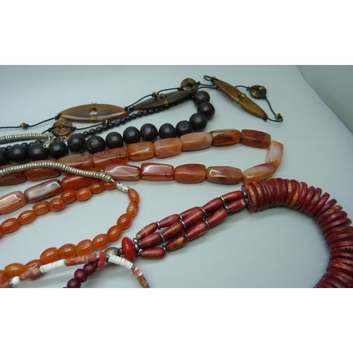 1001 - An agate bead necklace, coral, French jet, etc.