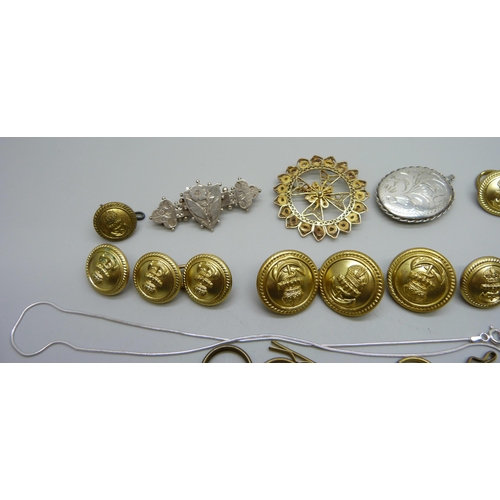 1004 - A Victorian silver brooch, Birmingham 1887, a silver locket, a chain a/f, a silver gilt brooch and a... 