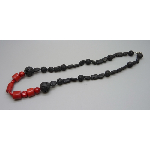 1005 - A lava stone and coral necklace