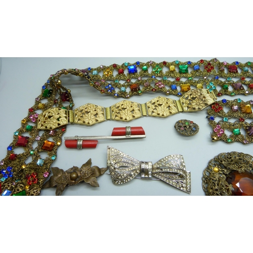 1009 - A vintage Czech belt, brooches, etc., some brooches lacking pins