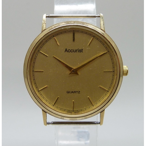 1035 - A 9ct gold Accurist quartz wristwatch, total weight 19.1g, 32mm case