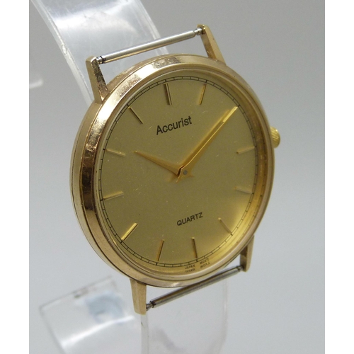 1035 - A 9ct gold Accurist quartz wristwatch, total weight 19.1g, 32mm case