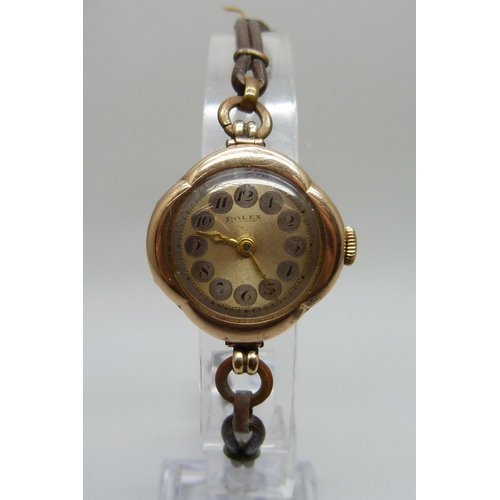 1039 - A 9ct gold cased Rolex wristwatch, the dial, movement and case marked Rolex, the case bears inscript... 