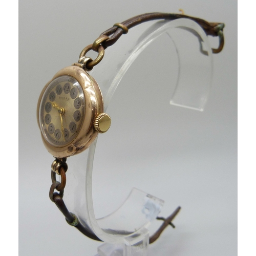 1039 - A 9ct gold cased Rolex wristwatch, the dial, movement and case marked Rolex, the case bears inscript... 