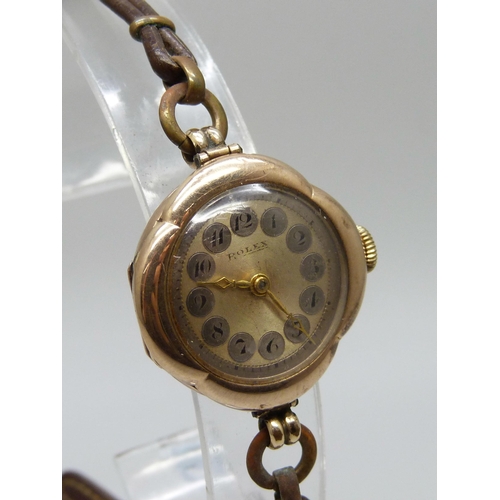 1039 - A 9ct gold cased Rolex wristwatch, the dial, movement and case marked Rolex, the case bears inscript... 