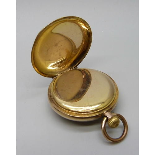 1040 - A 9ct gold fob watch in fitted case, total weight 25.3g, 32mm case